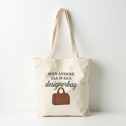 Tote bag met de tekst mijn andere tas is een designerbag